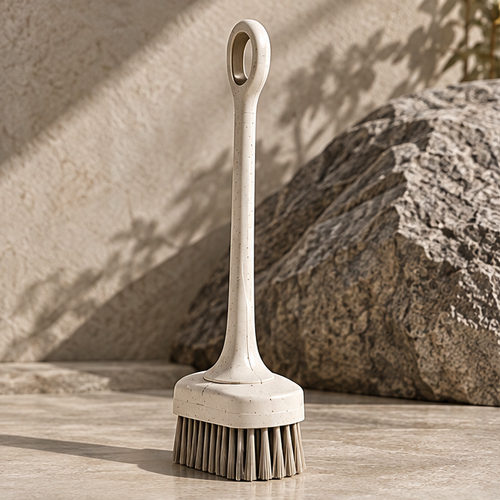 STONE self-standing scrubbing brush stored beside a bathroom cabinet