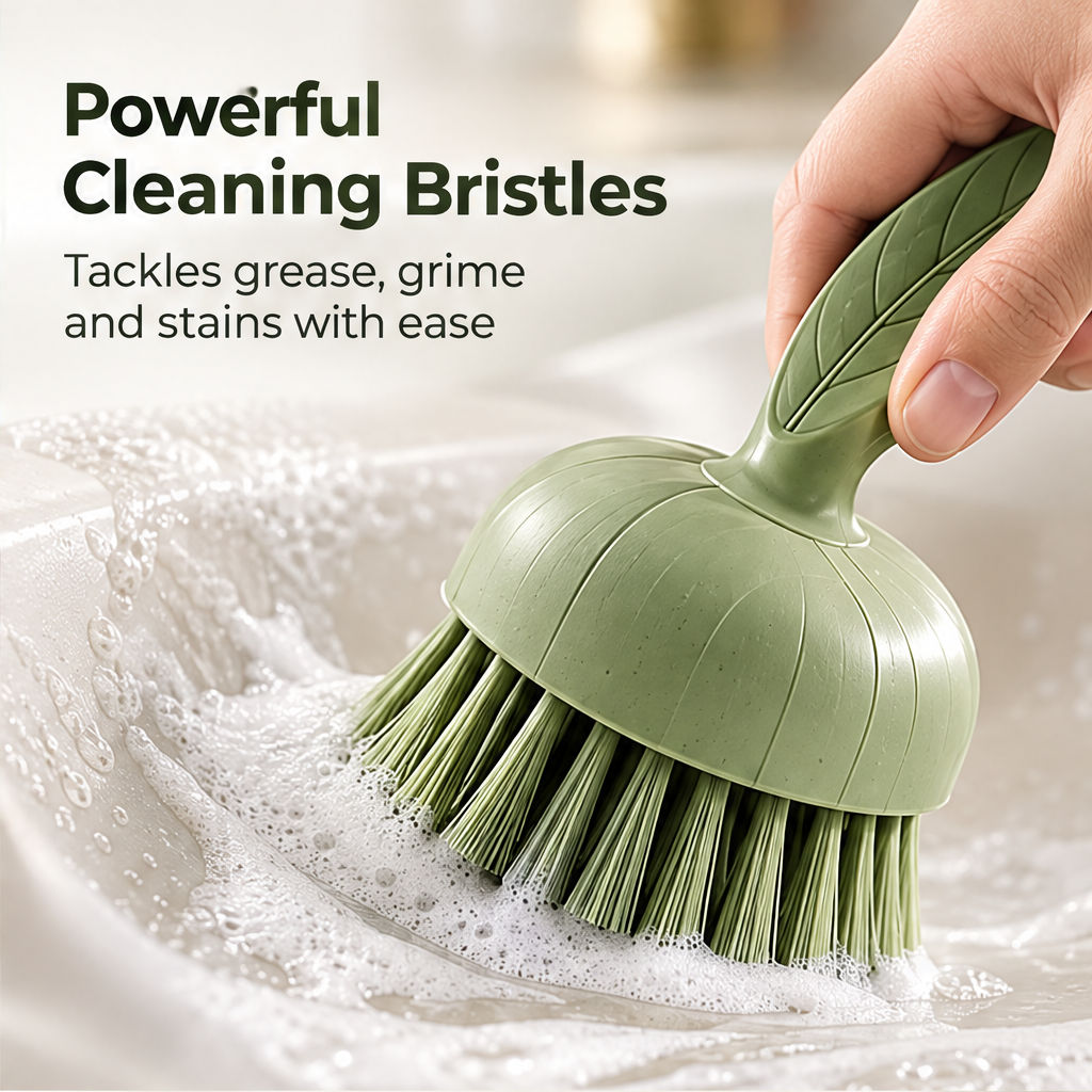 NATURA round green scrubber with leaf-shaped handle against a green background without text