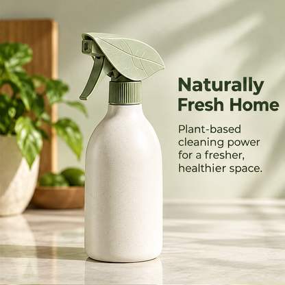 NATURA cleaning spray showing its leaf-vein spray head and speckled cream bottle